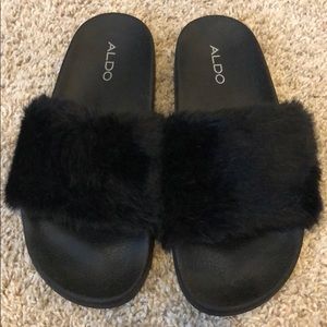 Black Aldo furry slides